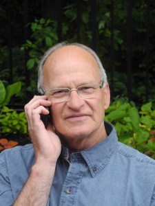 George chatting to one of the girls on his cell phone...