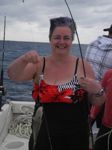 catching pretty little fish with gorgeous blue stripes...