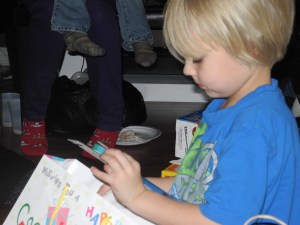 examining one of the many presents...