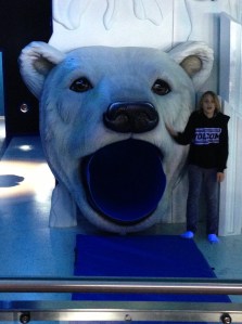 ready to scare whichever sibling comes out first...