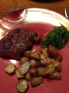 steak, roasted potatoes with truffle oil and seaweed salad...