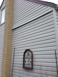 siding flapping in the wind...