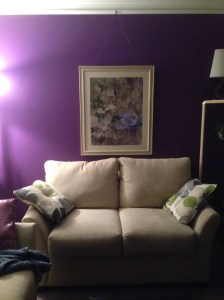 purple wall with new picture hanging...